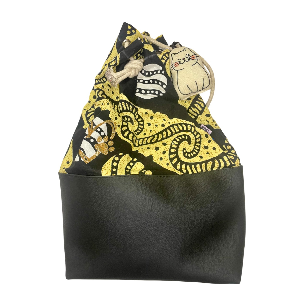 Sacca zaino in tessuto wax e similpelle | Associazione Le Sfigatte