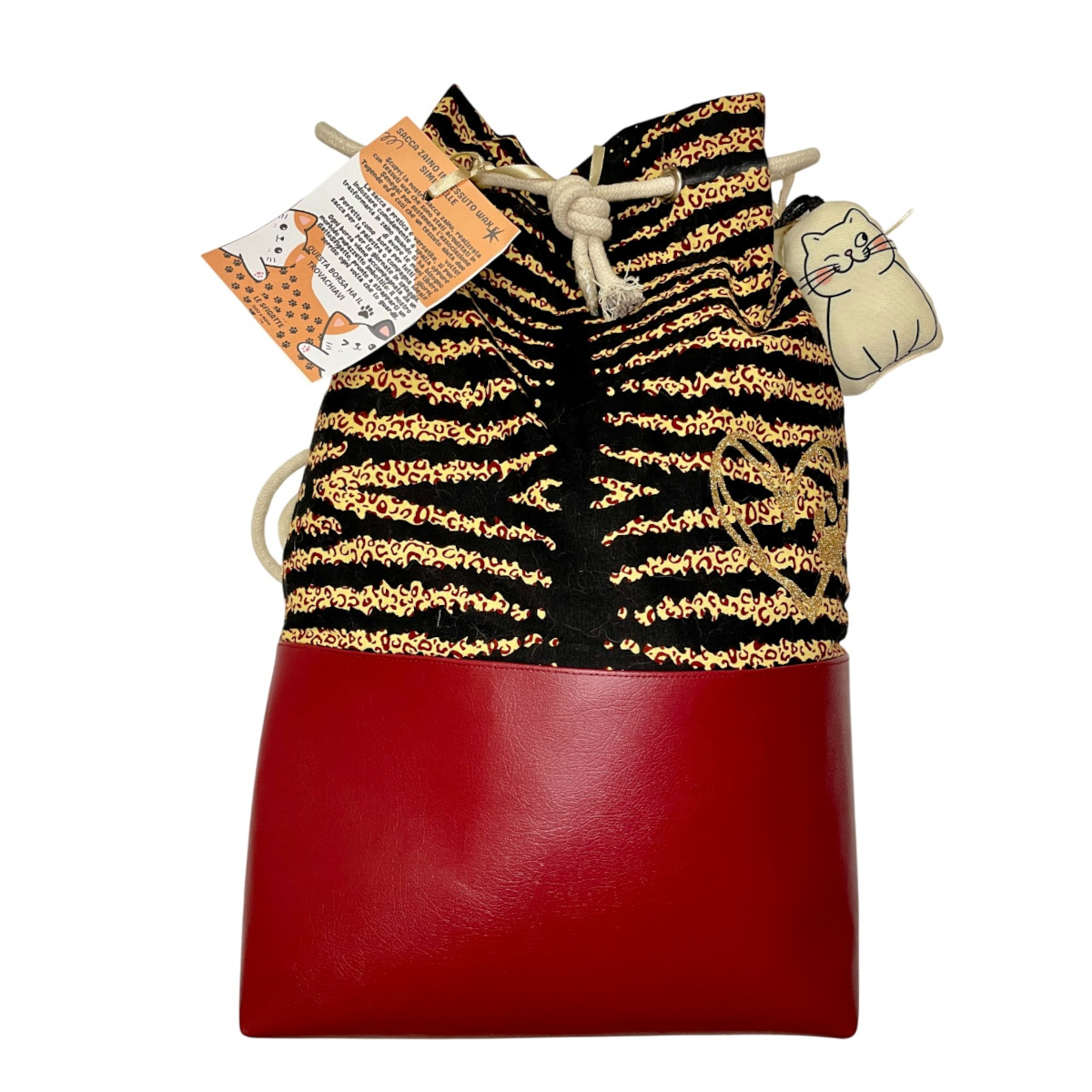 Sacca zaino in tessuto wax e similpelle | Associazione Le Sfigatte