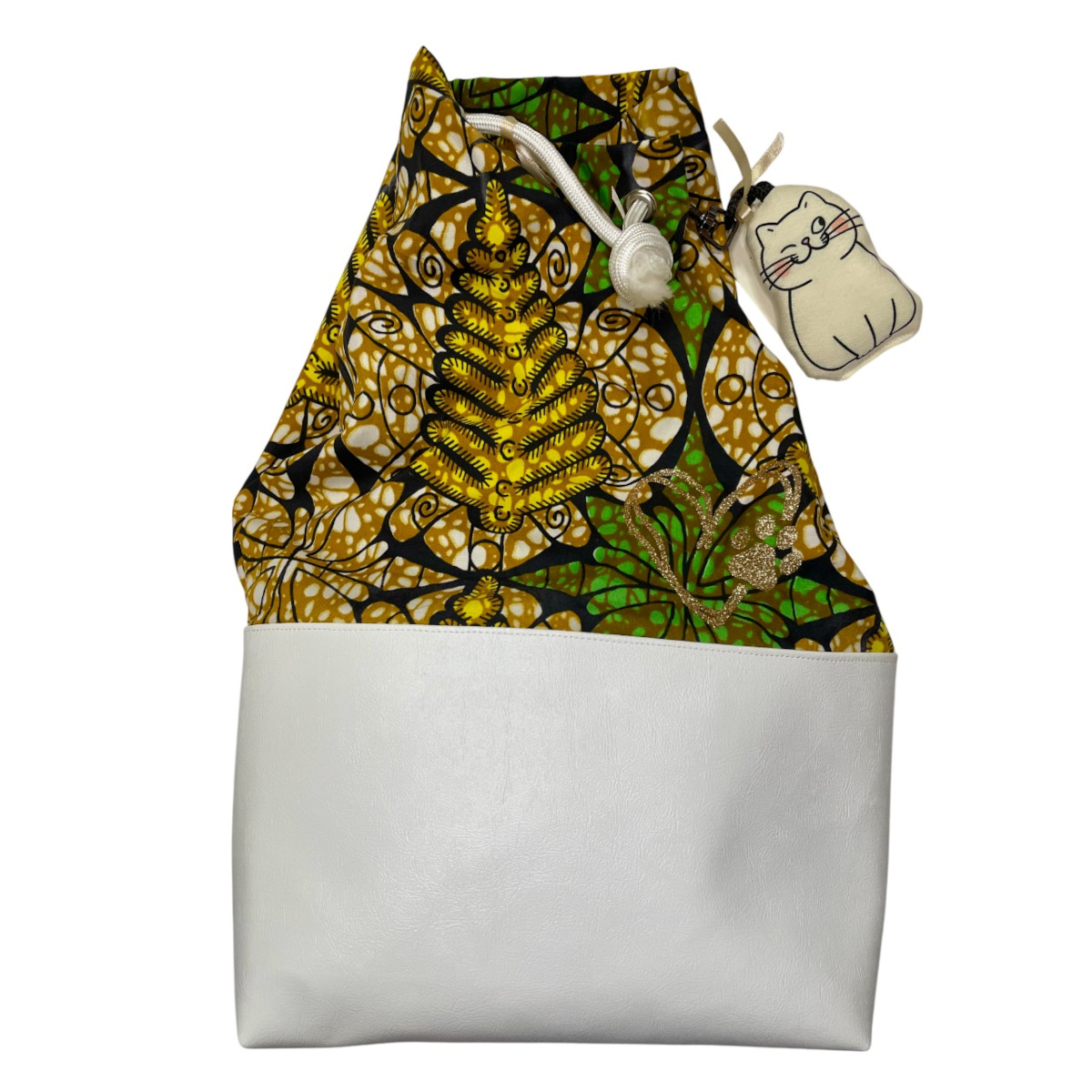 Sacca zaino in tessuto wax e similpelle | Associazione Le Sfigatte